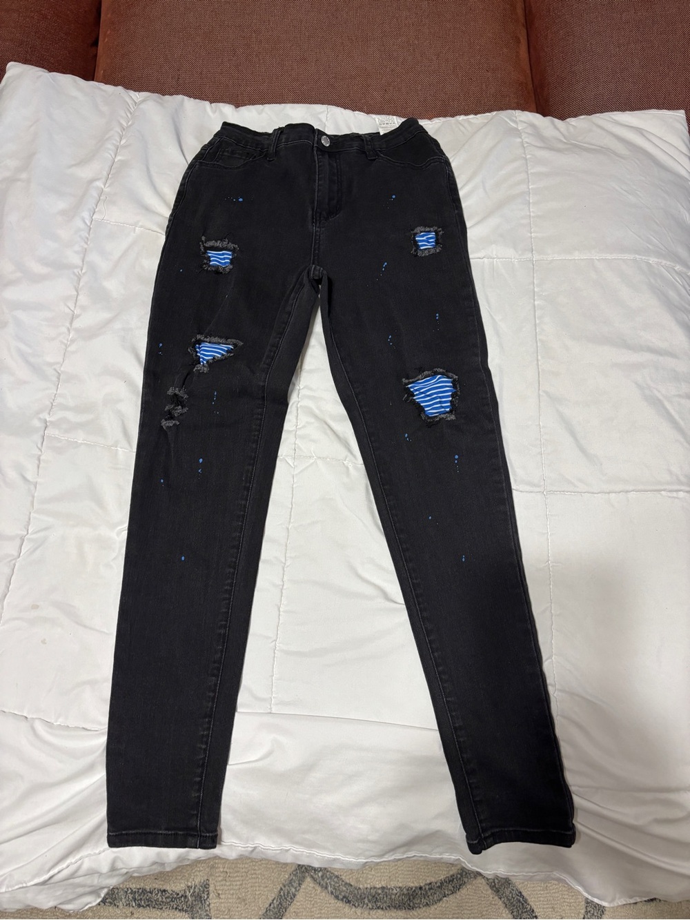 SHEIN Black Ripped Jeans with Blue Striped Knee Patches